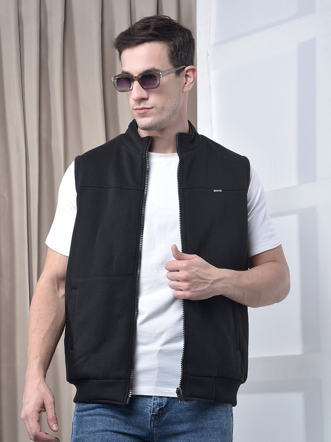 cobb solid black sleeveless reversible jacket