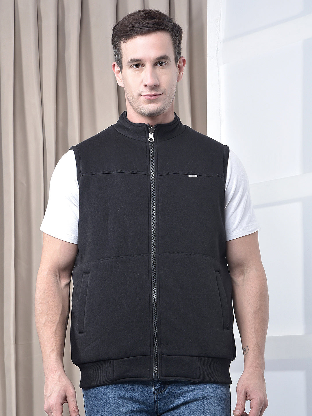cobb solid black sleeveless reversible jacket