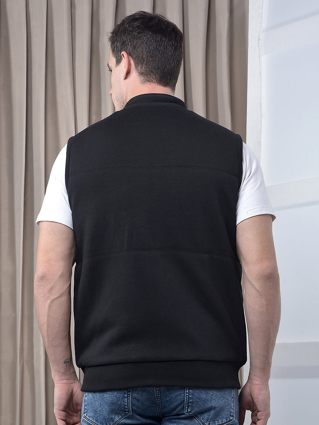 cobb solid black sleeveless reversible jacket