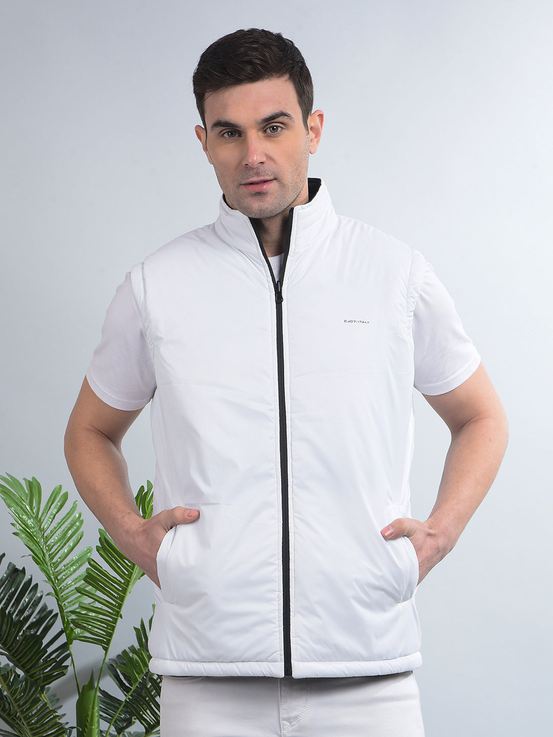 cobb solid black white sleeveless reversible jacket