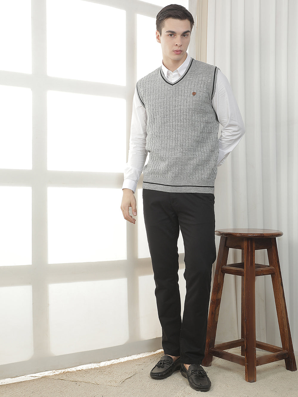 grey sleeveless v-neck sweater