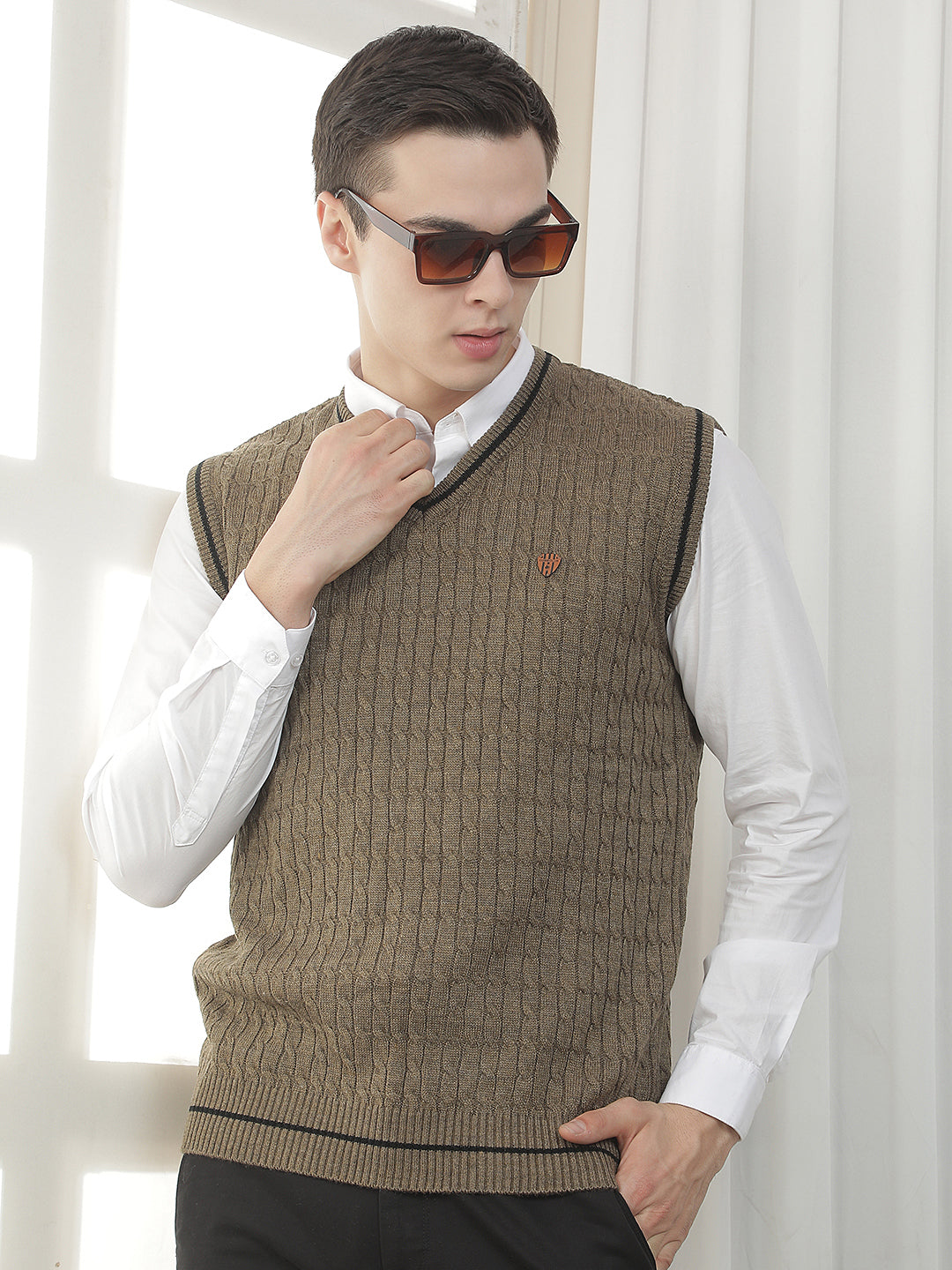 brown sleeveless v-neck sweater