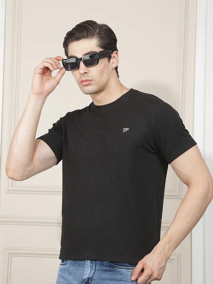 black solid round tees