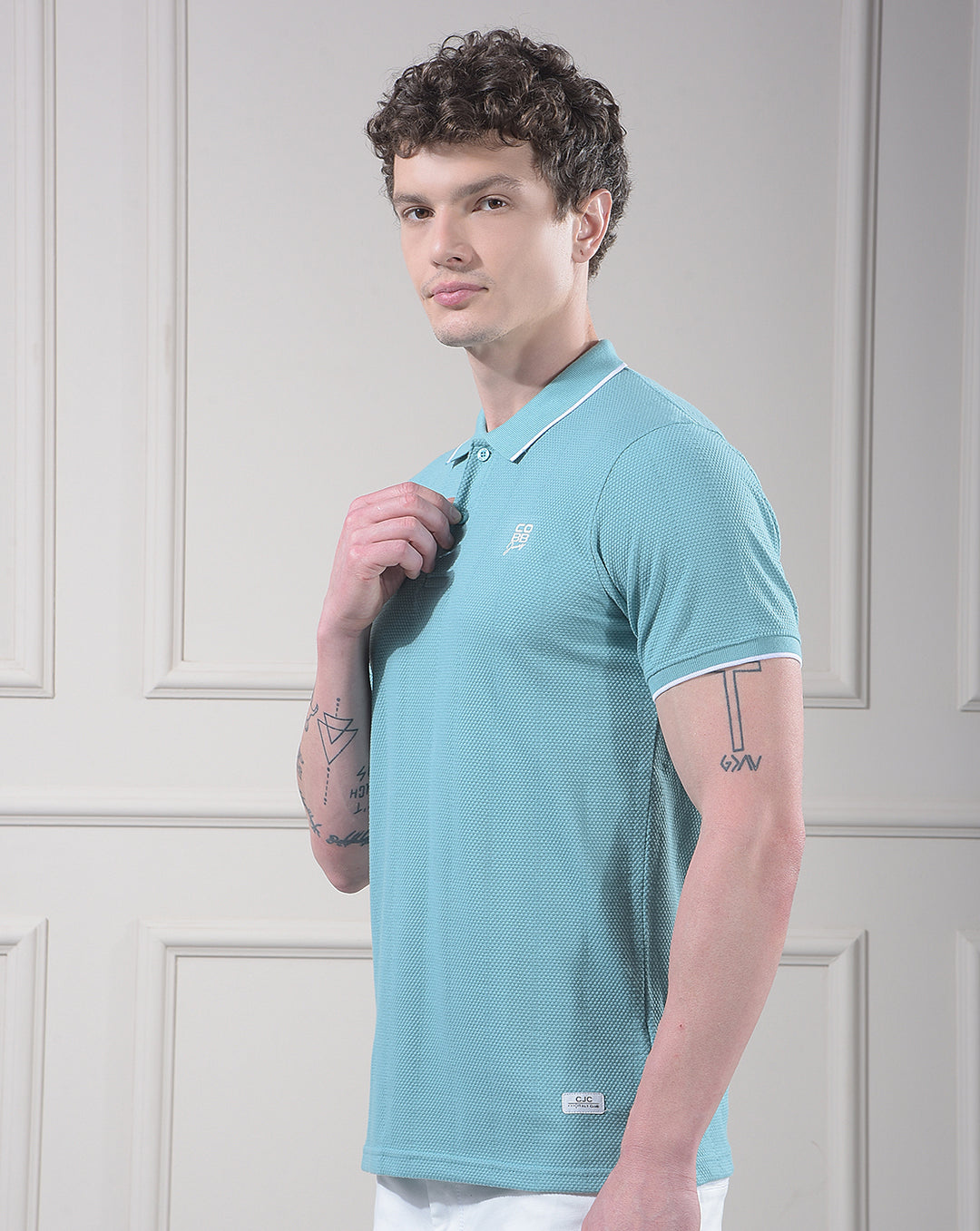 cobb sea green solid polo neck t-shirt