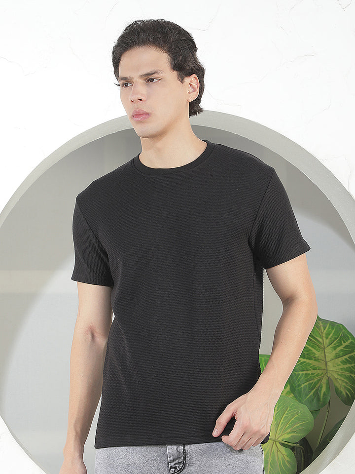 black self-design round tees