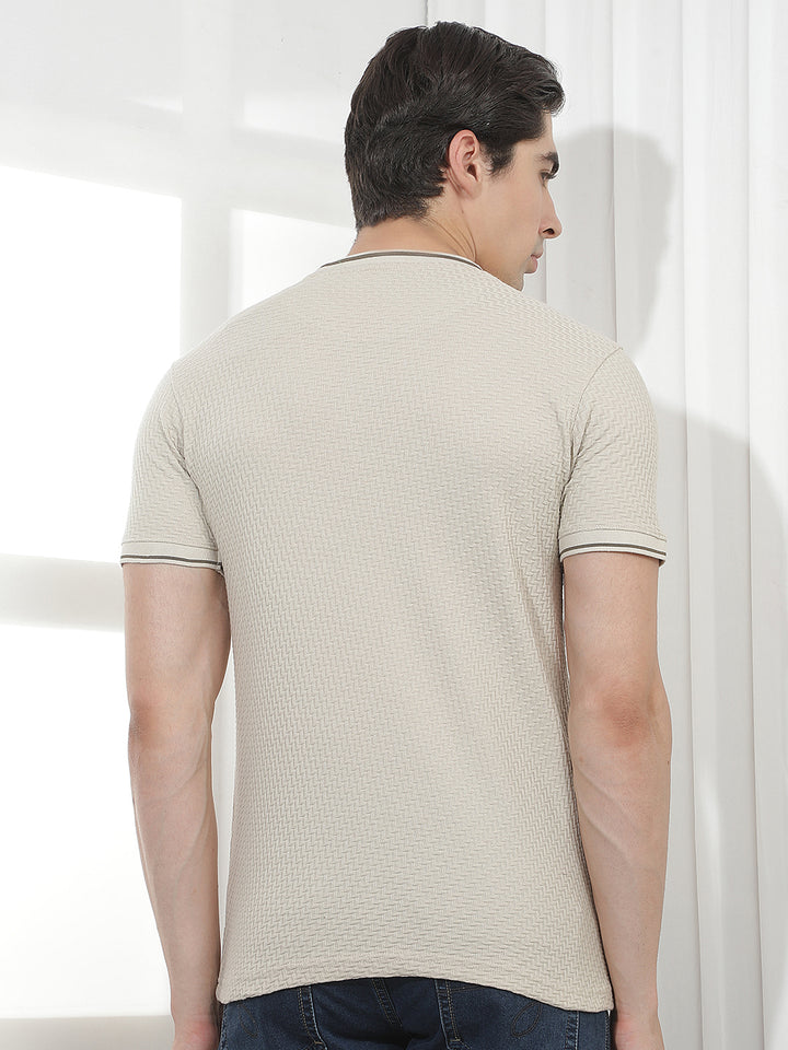 beige self-design round tees